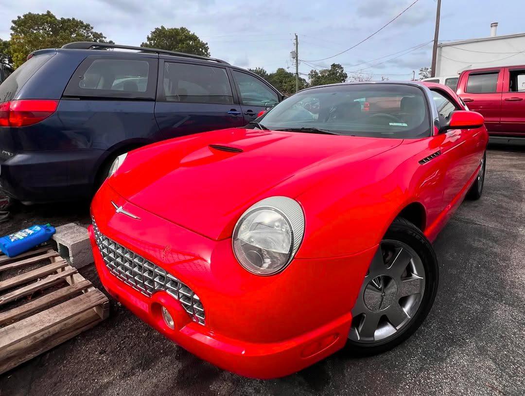 Red Ford Thunderbird at the shop